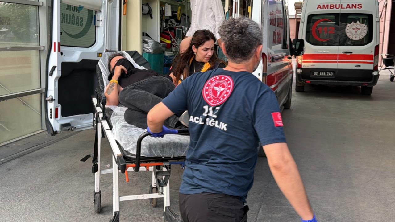 Şiddete maruz kalan kadını kurtarmak isterken yaralandı!